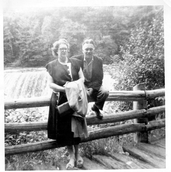 1951-0718 - Gladys-Paul sitting on rail fence