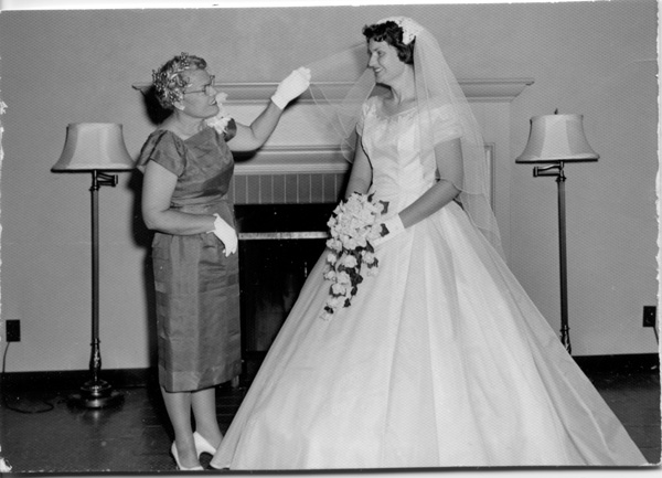 1960-0731 - Jerry-Pam Wedding Mom pretties the bride